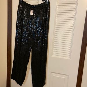 Formal wear Black sequined pants .